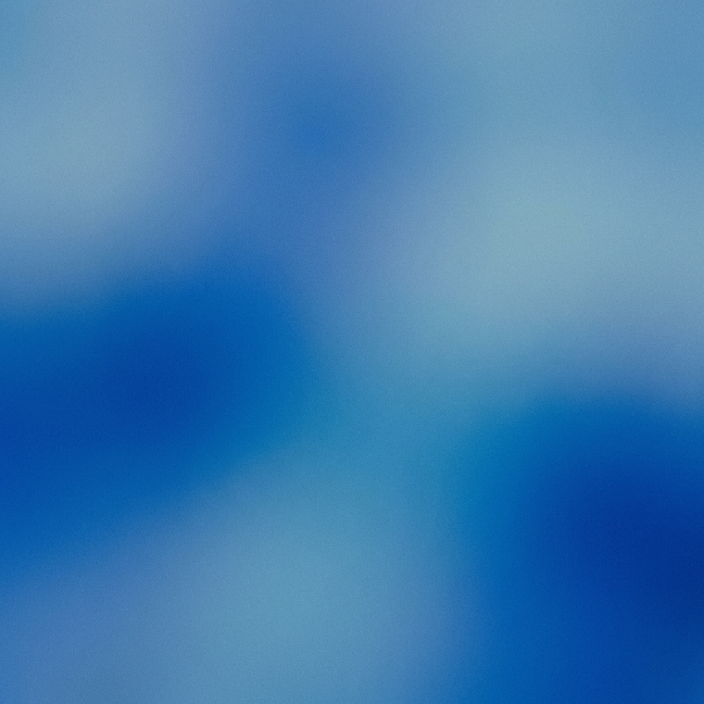 Abstract gradient of blue shades with a subtle grainy texture.